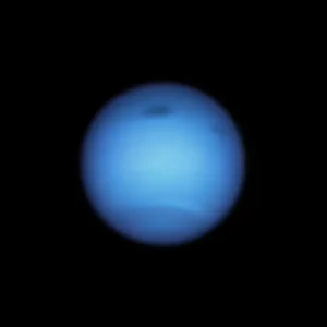 Dark Storm on Neptune Reverses Direction, Possibly Shedding a Fragment