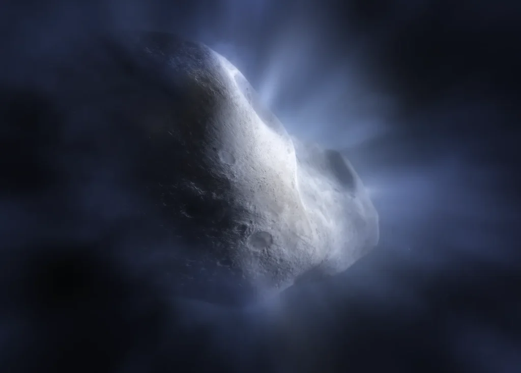 Illustration, close up of rocky, potato-shaped body of a comet with detailed, cratered surface. Glowing rays emanate from the rocky surface like sunlight through clouds, representing water ice being vaporized by the heat of the Sun.