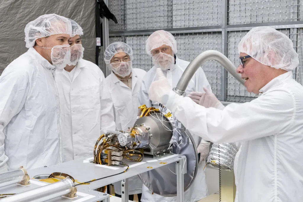 People working in a clean room environment