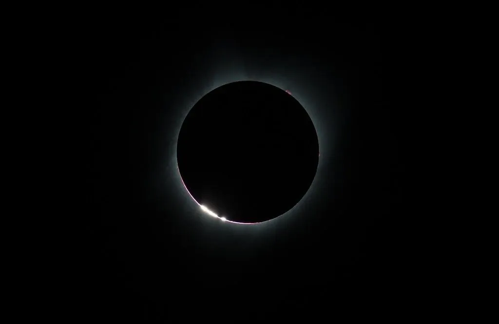 Sunlight passes through the Moon’s rugged terrain creating the Baily’s Beads effect during the total solar eclipse on Aug. 21, 2017