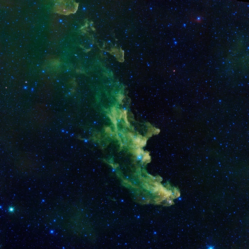 A witch appears to be screaming out into space in this new image from NASA’s Wide-Field Infrared Survey Explorer, or WISE. The infrared portrait shows the Witch Head nebula, named after its resemblanc