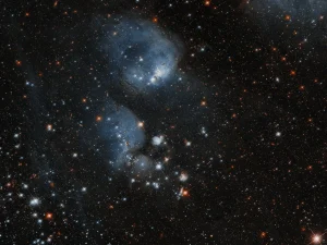 Hubble Examines Stars Ensconced in a Cocoon of Gas
