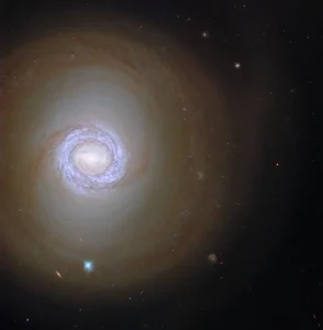 Hubble Pinpoints Young Stars in Spiral Galaxy