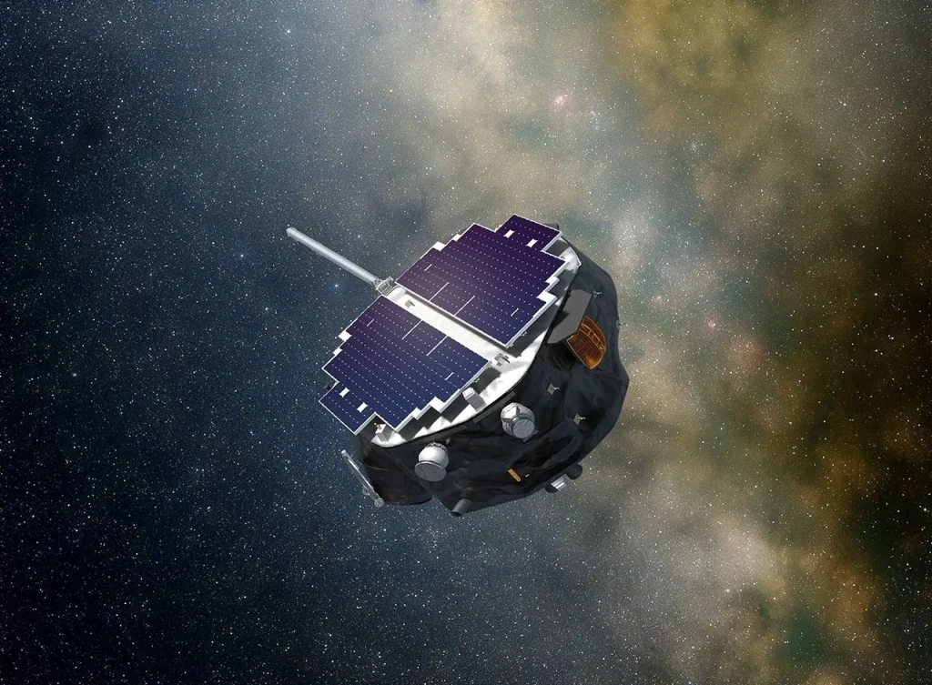 A circular spacecraft floats in space with stars and dust visible in the background.