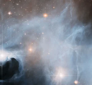 Hubble Observes Ghostly Cloud Alive with Star Formation