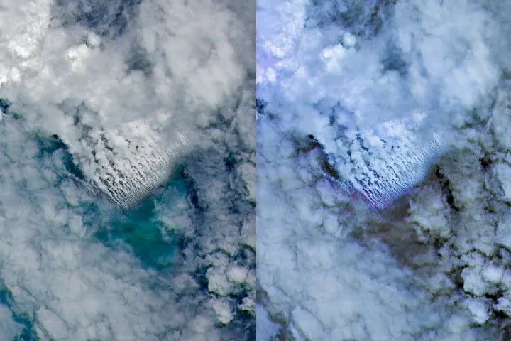 Only small patches of the ocean are visible through puffy, white volcanic plumes streaming from the center of the scene. Clouds not directly related to the eruption are visible throughout much of the image. A false-color inset box shows the infrared signature of the eruption as a series of red dots near the volcanic plumes.