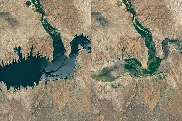 The reservoir is nearly empty by May 2026. The Gila River's natural channel is now visible and flanked with green vegetation in what had been the bottom of the reservoir.
