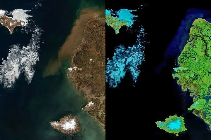 Two large, partly snow-covered islands lie west of mainland Alaska. Sea ice fragments form swirling patterns in the ocean, and brown water lines part of the Alaskan coastline.