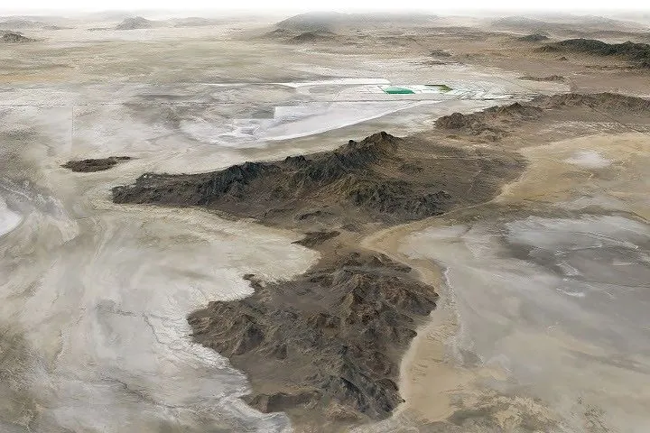 Tan and white plains surround a dark mountainous ridge in a three-dimensional image of the Silver Island Mountains.