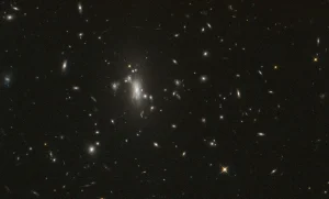 NASA’s Hubble Seeks Lensed Supernova, Marks 200,000 Orbits